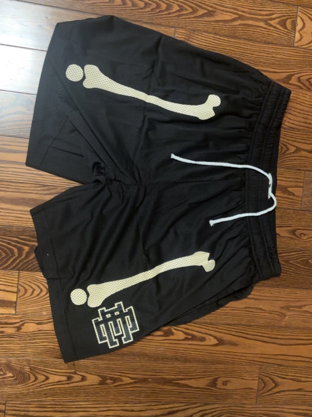 Eric Emanuel Black Mesh Shorts with Cream Bone Graphics and White Drawstring